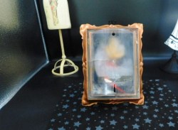 small framed doll a bk